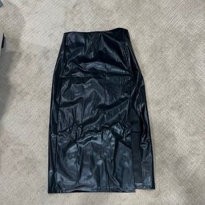 Micas black faux leather skirt. Never worn